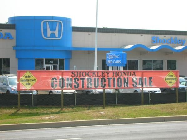 MESH017 - Custom Mesh Banner and Building Wrap for Auto Dealerships & Services 