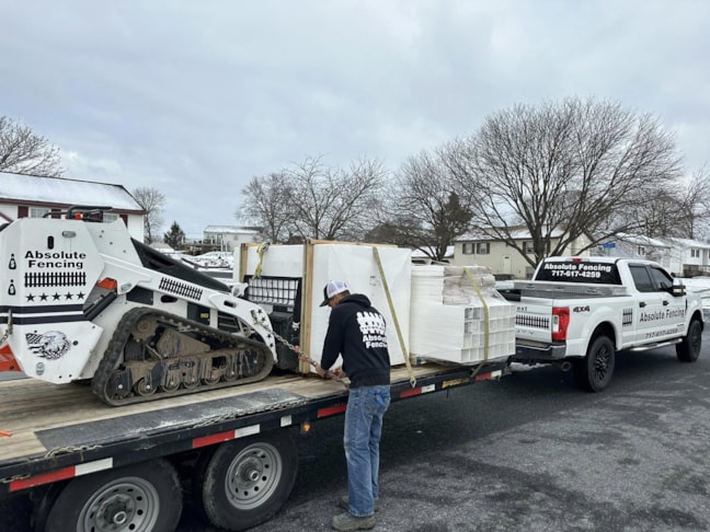 Skid Loader and Truck_Absolute Fencing