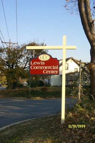 Post and panel signs with dimensional letters