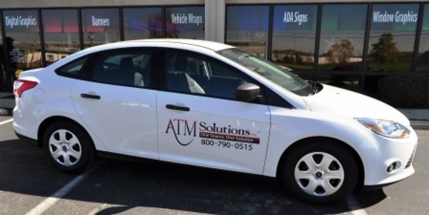 Promote your business with custom vehicle graphics.  (Vehicle graphics by Signs Now Cincinnati for ATM Solutions, Cincinnati, OH)