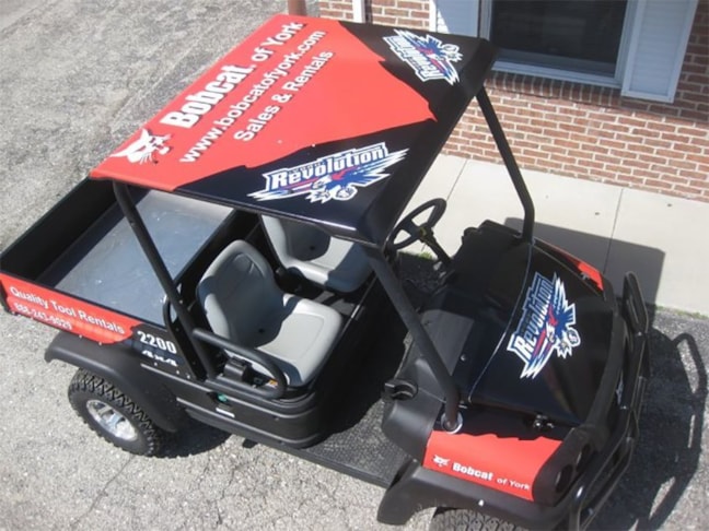 Signs Now Hanover designed and installed the partial wrap and graphics on this Bobcat for Bobcat of York and the York Revolution.
