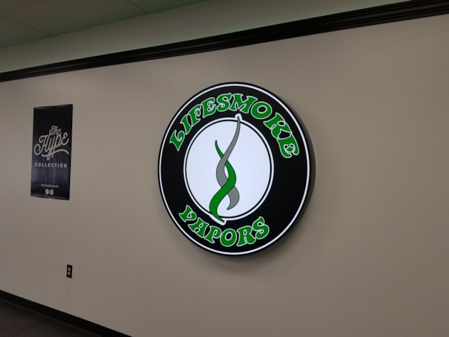 Interior lighted channel logo sign