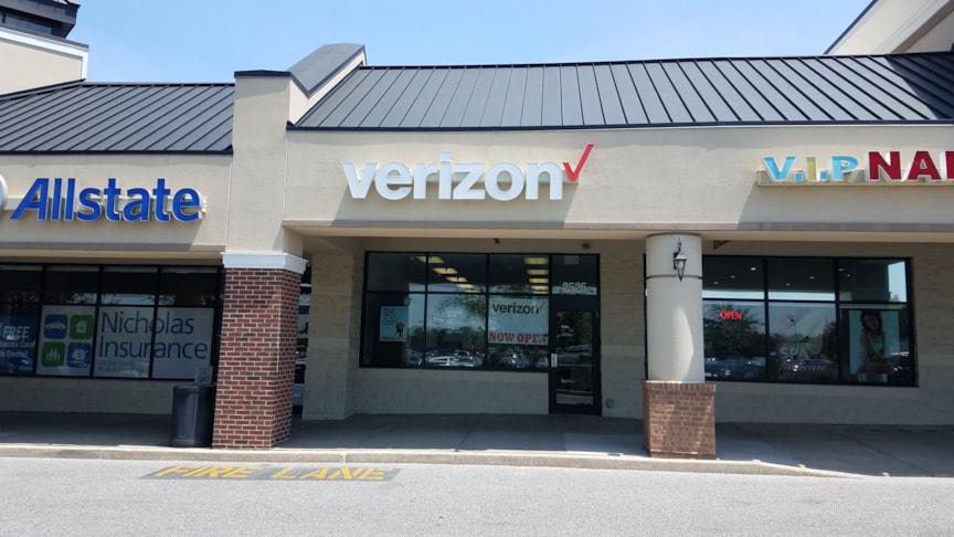 Lighted channel letter sign on raceway