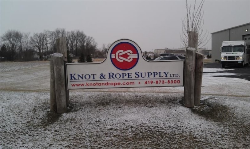 Sandblasted sign for a Perrysburg business, made from high density foam, painted and installed on nautical posts.