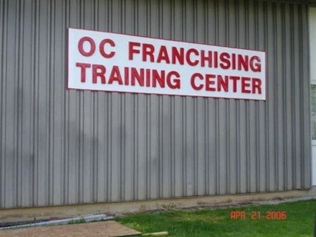 Digitally printed lettering mounted on front of business