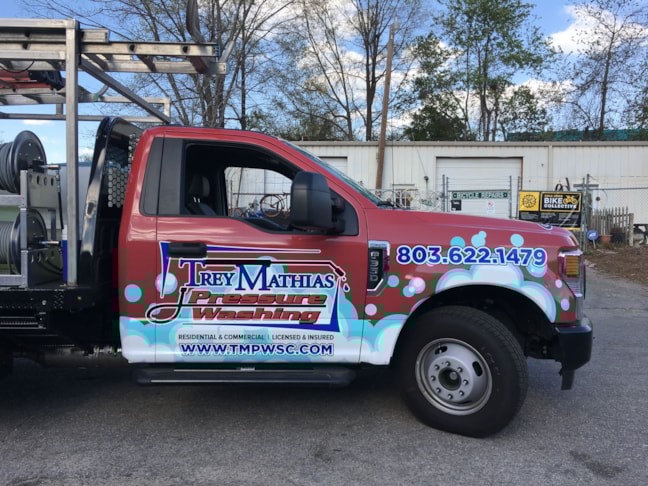Trey Mathias Pressure Washing Partial Vehicle Wrap