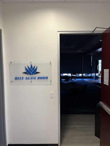 This is an acrylic standoff sign used for a large conference room.