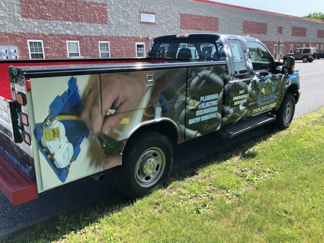 D. Baker Services full vehicle wrap