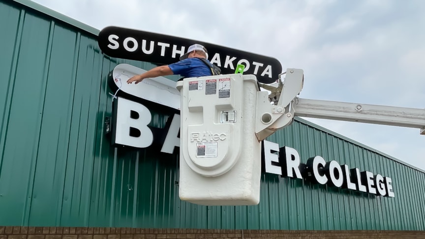 Channel letter install with a boom truck