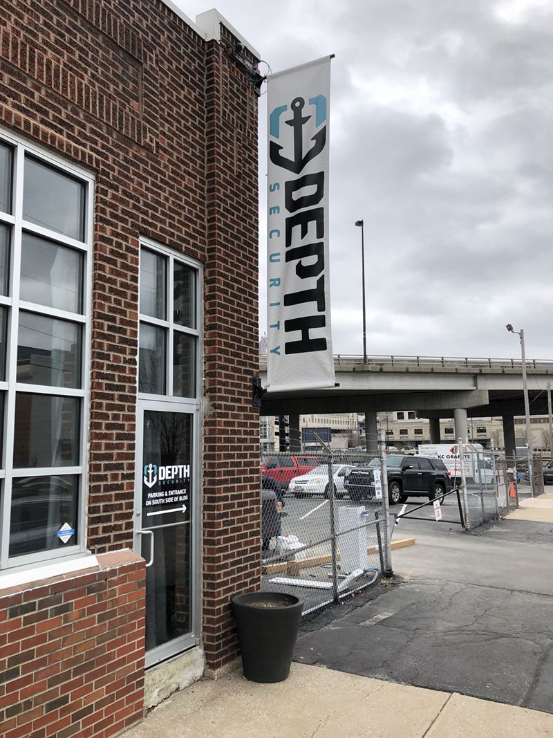 Double-sided Pole Banner for Depth Security in Kansas City, Missouri