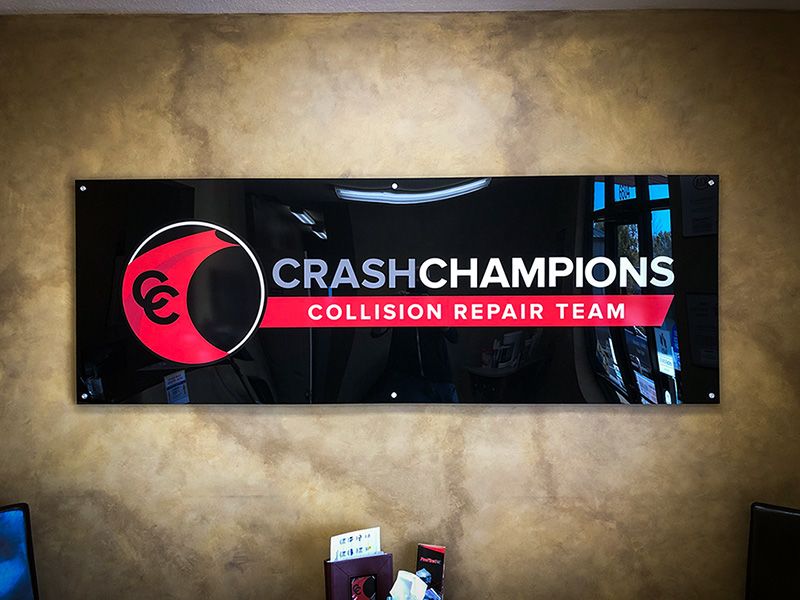Interior Acrylic Sign with Dimensional Letters and Logo for Crash Champions in Pleasant Valley, Missouri