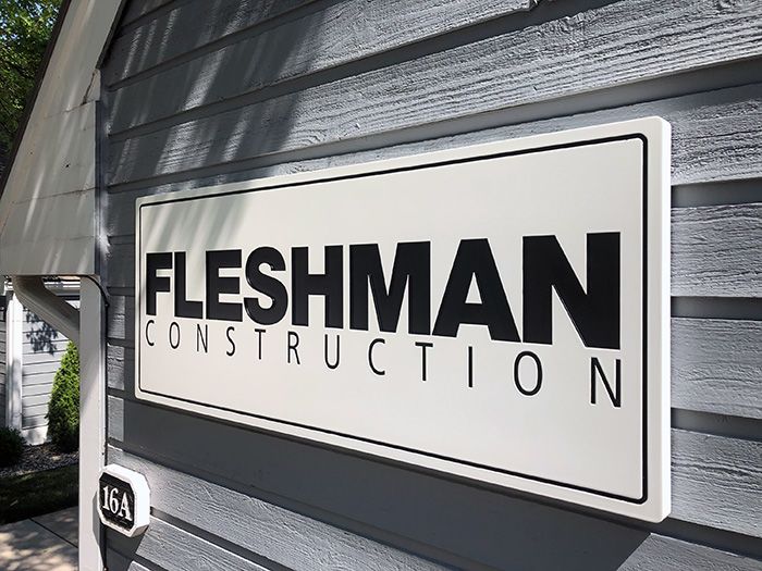 Exterior Routed Painted HDU Sign for Fleshman Construction in Liberty, Missouri