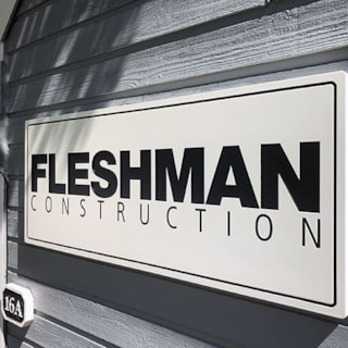 Exterior Routed Painted HDU Sign for Fleshman Construction in Liberty, Missouri