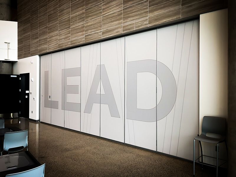 Custom Steel Door Vinyl Wrap for Burns Boys Commercial Contractors in Kansas City, Missouri