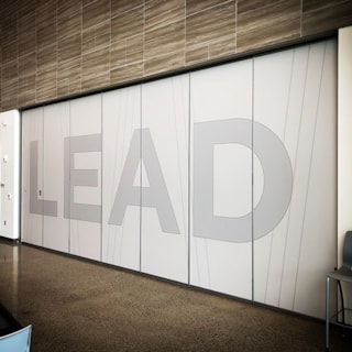 Custom Steel Door Vinyl Wrap for Burns Boys Commercial Contractors in Kansas City, Missouri