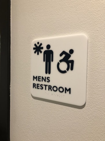 Interior ADA Restroom Sign for Medical Positioning Inc. in Kansas City, Kansas