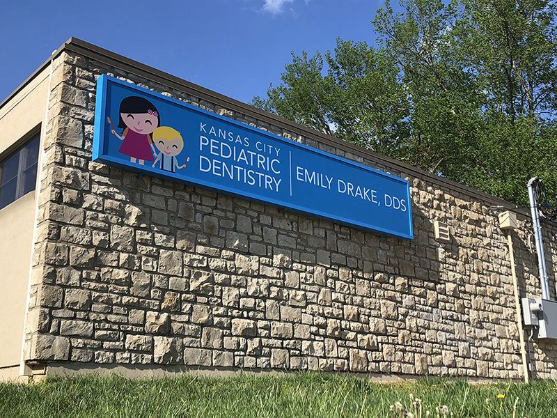 Exterior Acrylic Sign Insert for Existing Illuminated Lightbox for Kansas City Pediatric Dentistry in Kansas City, Missouri