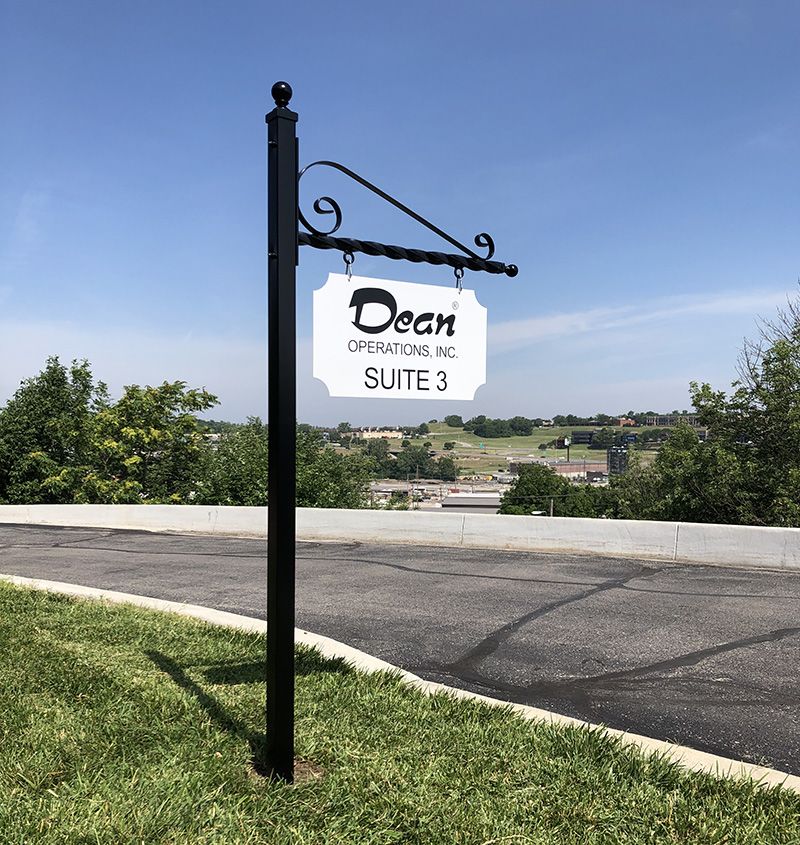 Exterior Metal Post with Scroll Bracket and Routed Metal Sign Panel for Dean Realty in Kansas City, Missouri in Kansas City