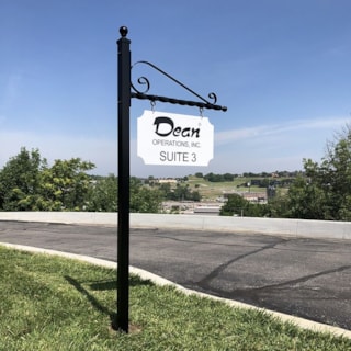 Exterior Metal Post with Scroll Bracket and Routed Metal Sign Panel for Dean Realty in Kansas City, Missouri in Kansas City