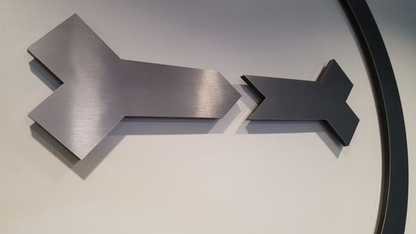 chicken bone el segundo 3d dimensional custom face brushed metal stand offs.jpg