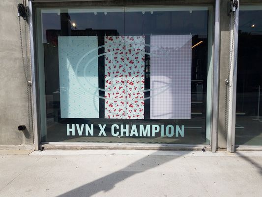 champion window display labrea hollywood acrylic hanging signs digitally printed sub surface.jpg
