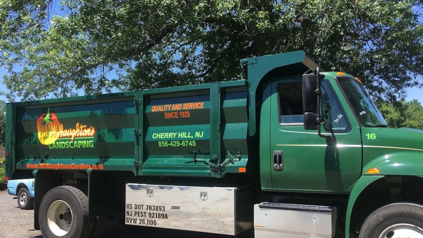 Printed vinyl graphics for McNaughtons Nurseries, Inc. Installed by our production team on location.