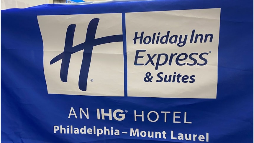 Fabric table throw for Holiday Inn Express Mt. Laurel. The company updated their logo and the hotel needed a new table throw.