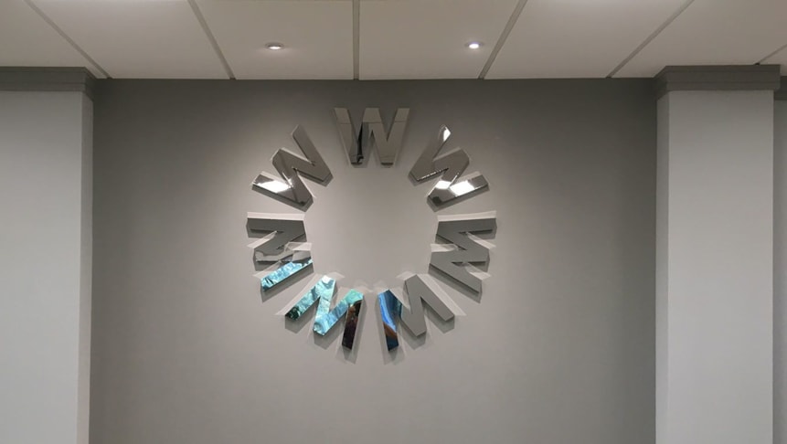 Polished stainless steel dimensional letters for Whitesells lobby.