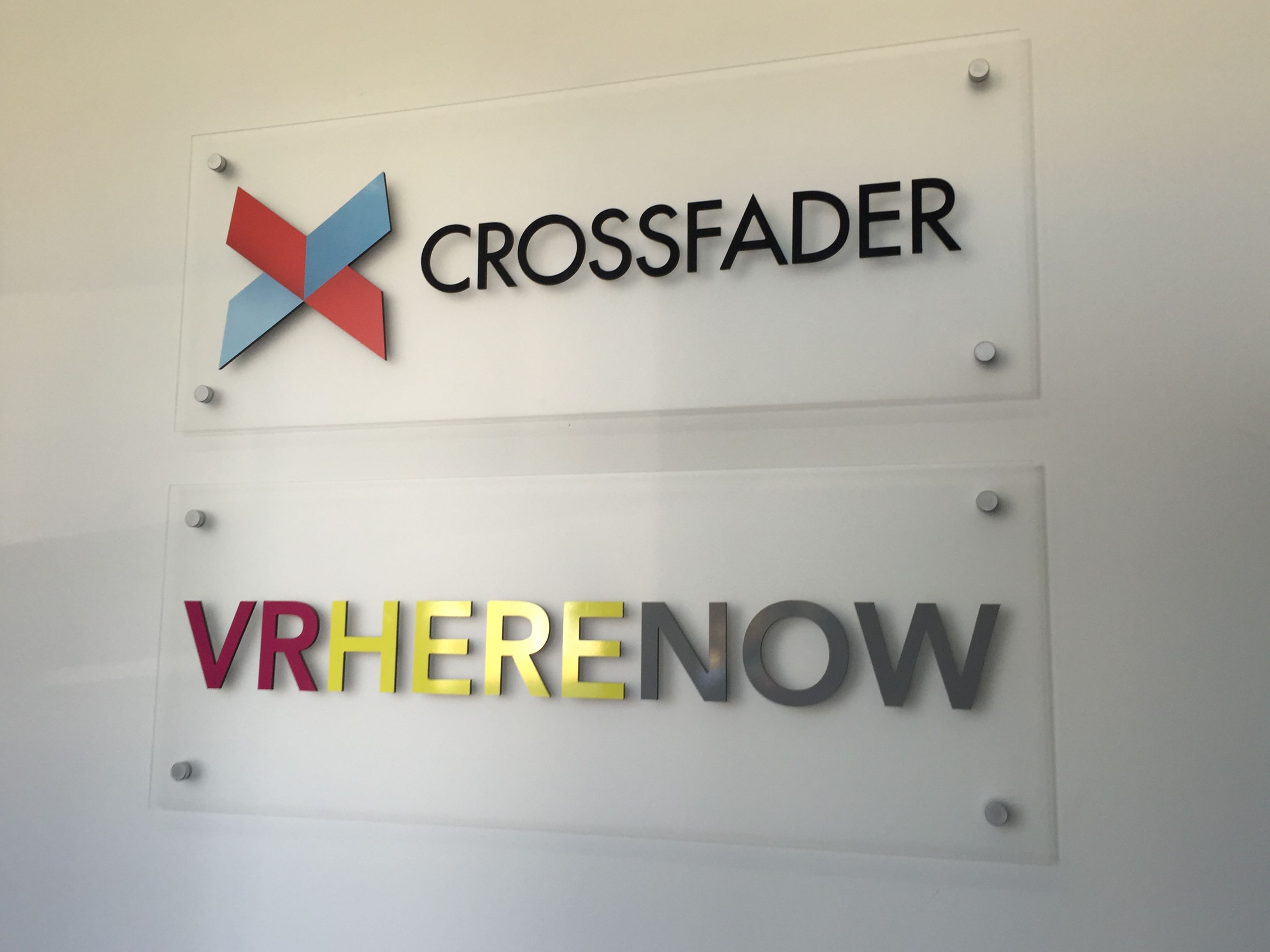 Reception signs for CrossFader and VRHereNow in San Francisco, CA