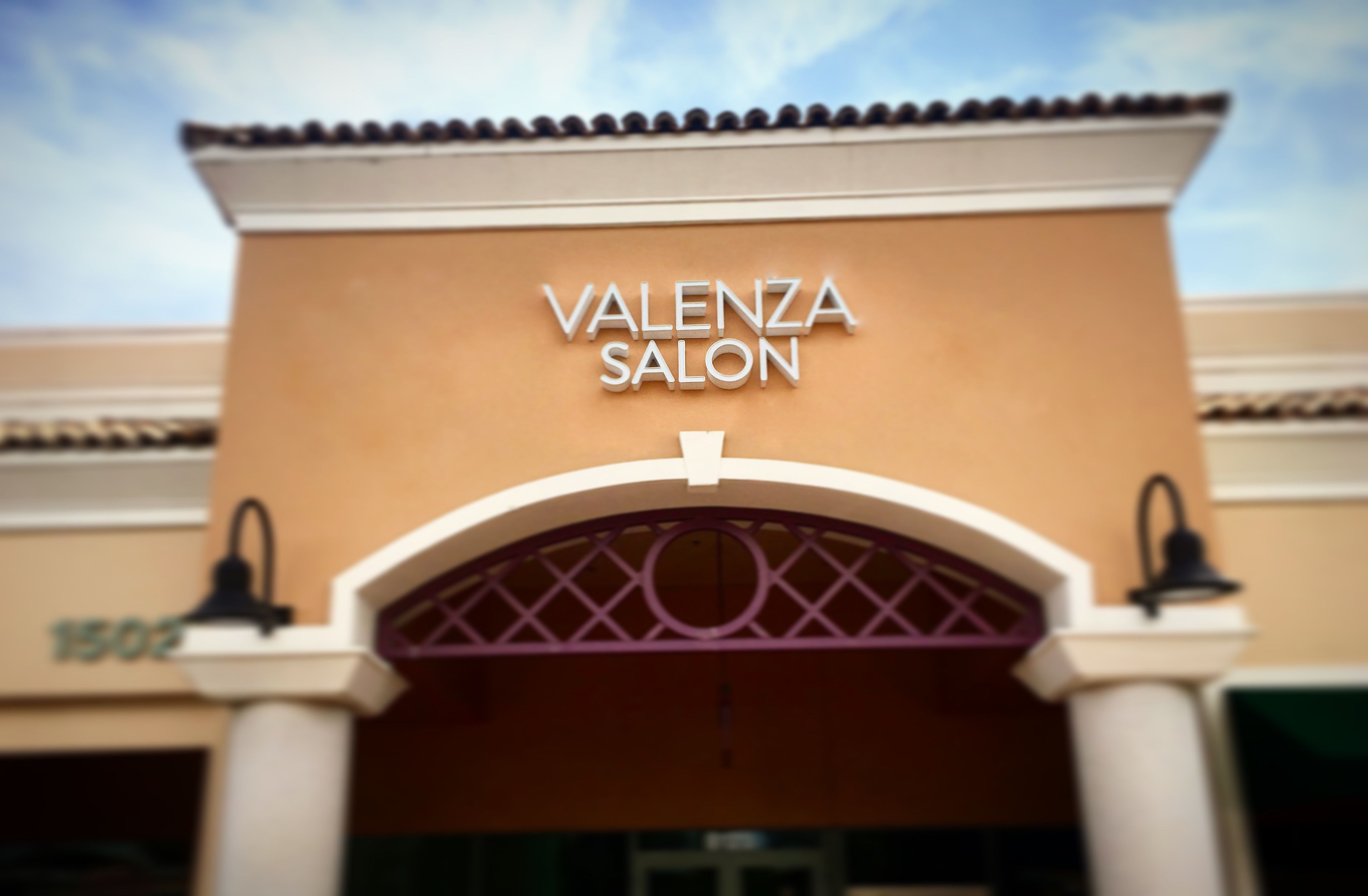 Architectural illuminated signage Valenza Salon
