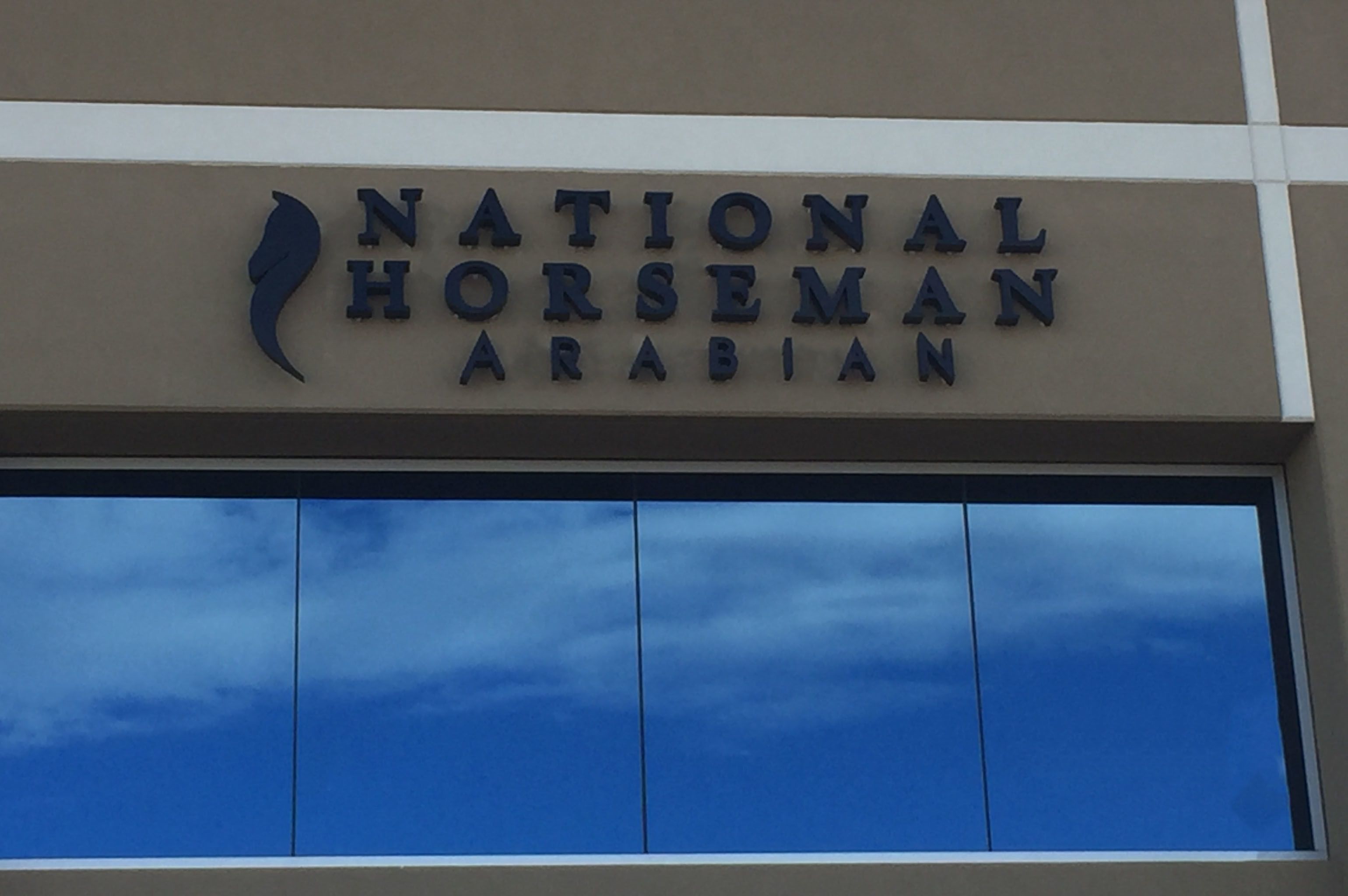Illuminated Building Sign for National Horsemen in Scottsdale Arizona