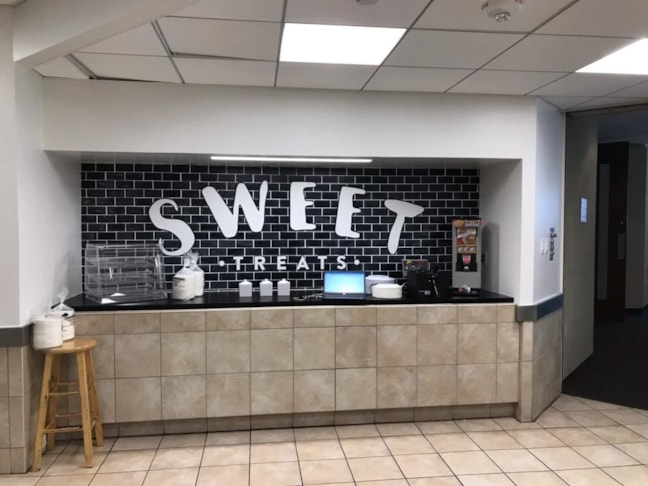 Interior Wall Wrap for Canteen Vending Services located inside the RJR building in downtown Winston-Salem,NC