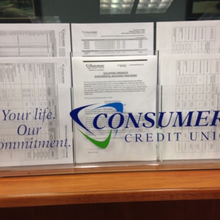 Acrylic brochure holder with logo for Consumers credit union. Gurnee, IL