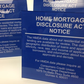 Acrylic self standing Home Mortgage Disclosure Act Notice signs. Gurnee IL