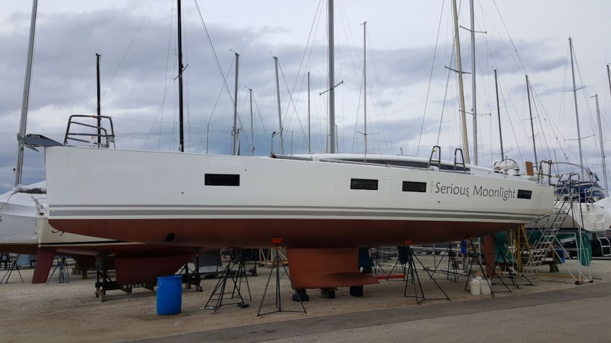 12 feet of lettering down side of 54 boat applied at Larsen Marine in Waukegan, IL boat is going to Milwaukee WI