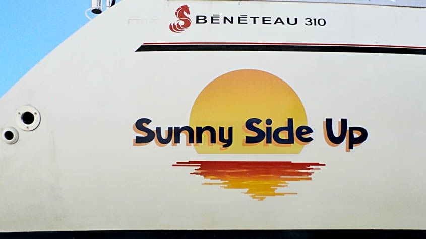 Sail boat with full color graphic print cut to shape of individual elements so there is no white outline