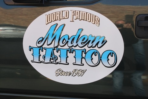 Full color print on oval shaped magnetic sign.