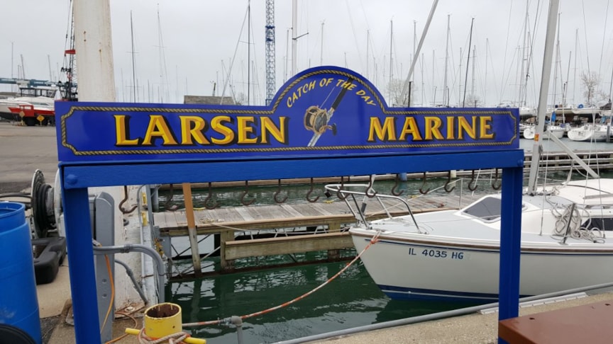 Sign made for taking photos of the fishing catch of the day at Larsen Marine in Waukegan, IL