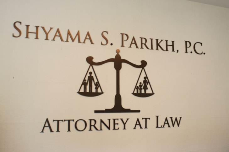 Metallic faced letters on wall of reception lobby at law office in Lake County IL (Waukegan)