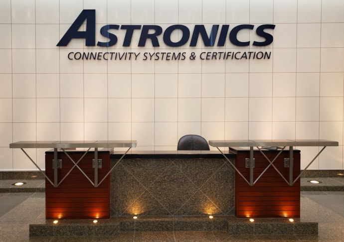 Large custom made dimensional letters for logo in grand foyer 