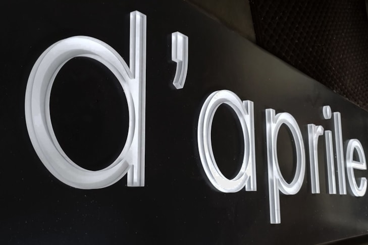 Routed aluminum and acrylic to create an edge lighting effect