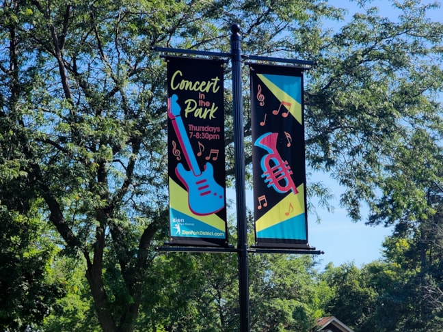 Street pole banners on pole with brackets