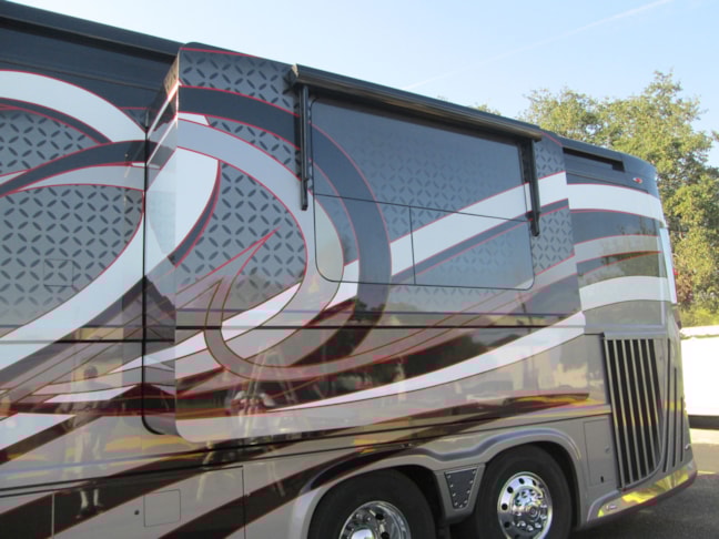 Complete custom window graphics designed and installed here at Image360 San Antonio west.  these were completely created from scratch to match the custom graphics on this beautiful motohome.